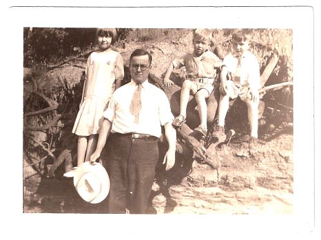 1930.. - sister Eileen, father Wilfred (Bapop), brother, Howard, Robert.jpg